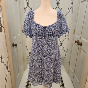 Floral Babydoll dress with smock back. Juniors Size 16/18